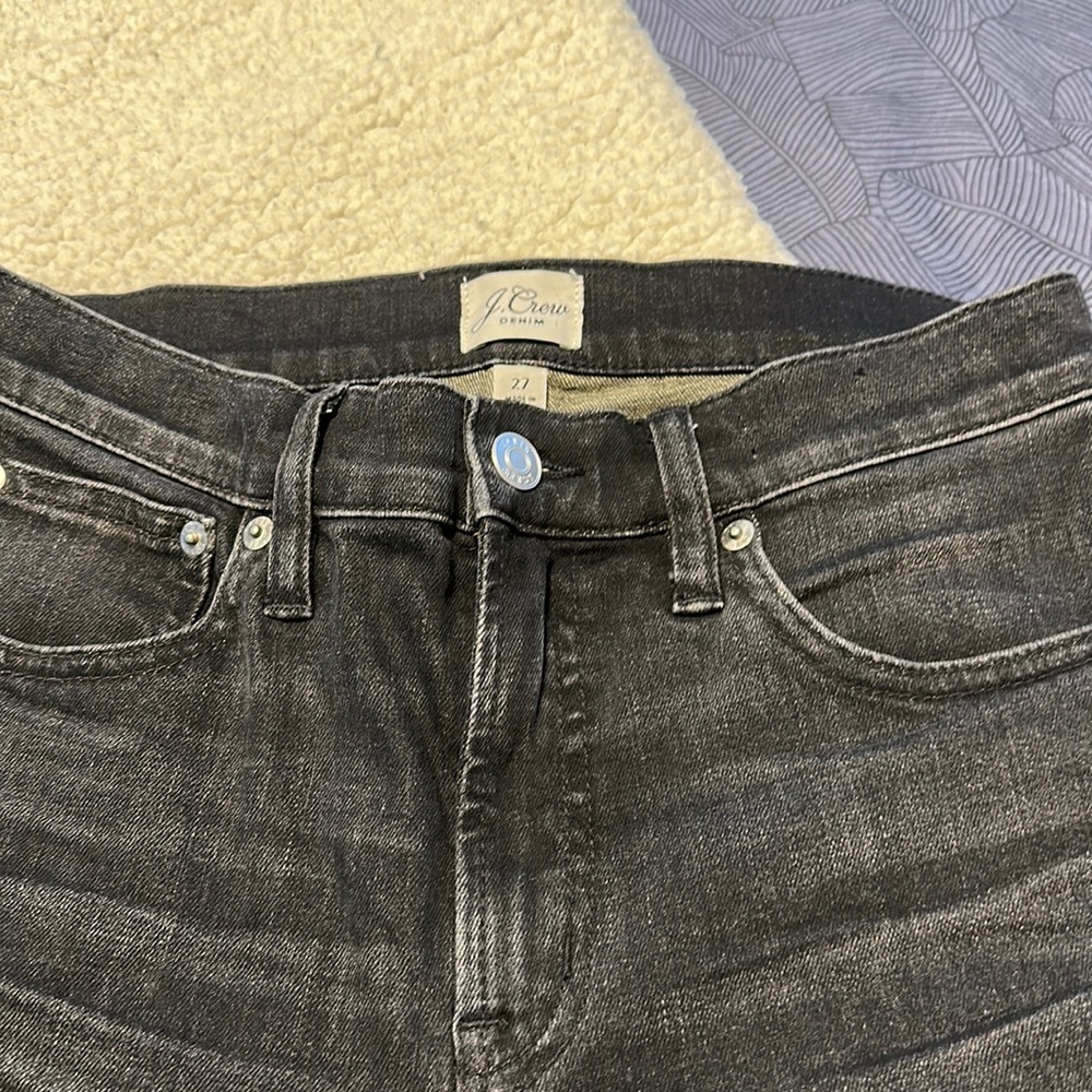 Adorable black distressed J Crew skinnies. Size 27